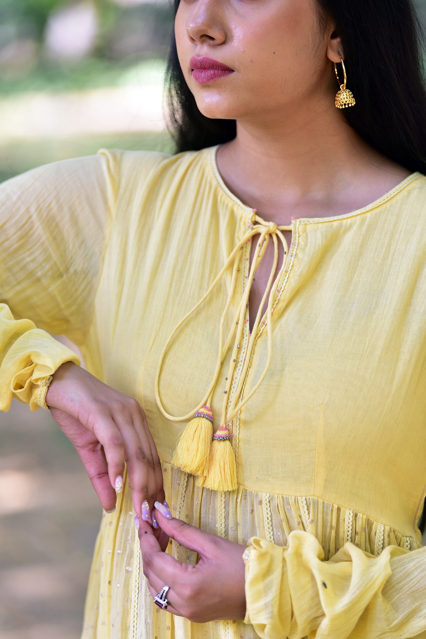 tasseled-yoke-pom-poms-churidar-full-sleeves-yellow-anarkali